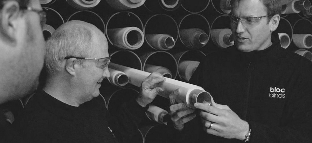 Bloc Blinds Employees Inspecting Fabric